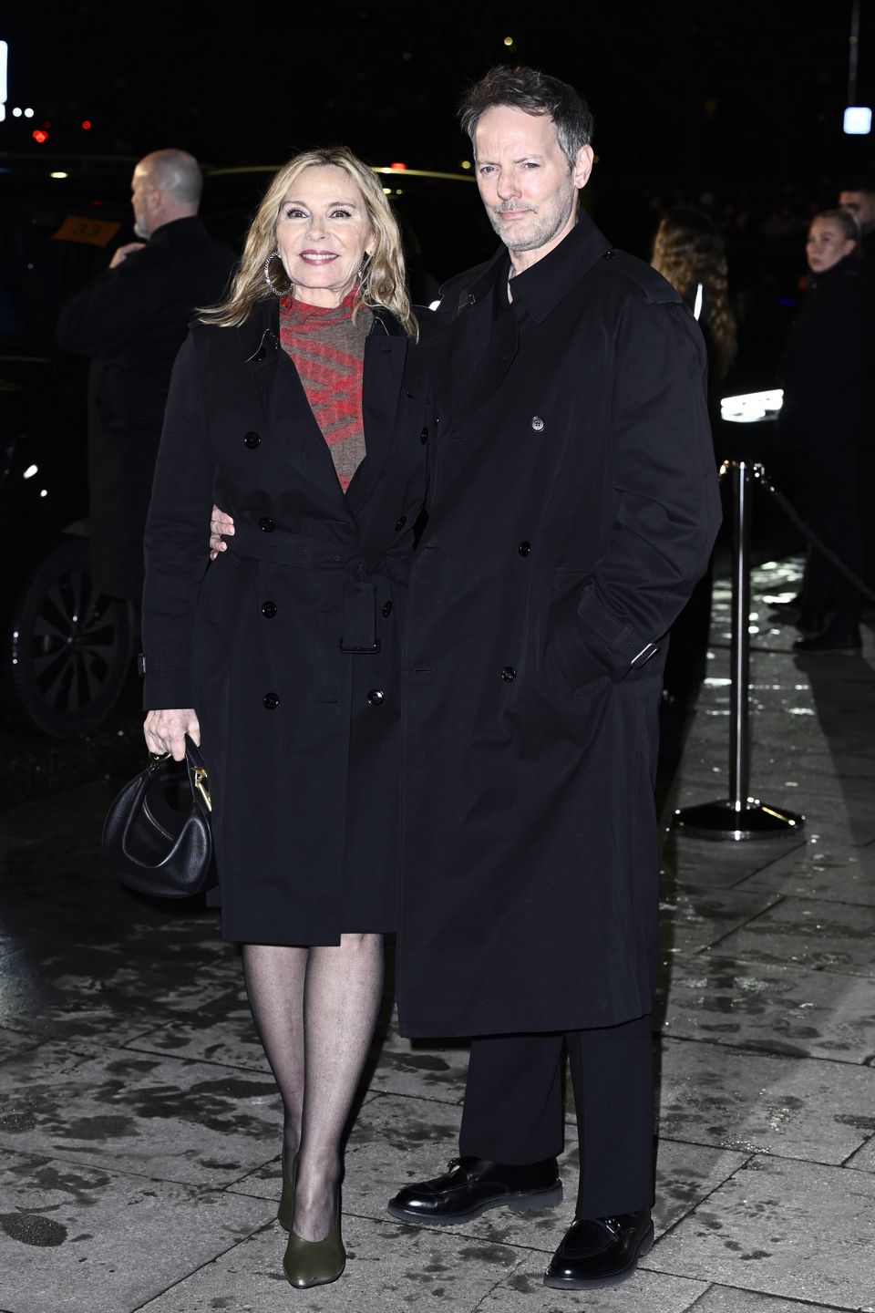LONDON, ENGLAND - FEBRUARY 24: Kim Cattrall and Russell Thomas attend the Burberry show during London Fashion Week February 2025 at Tate Britain on February 24, 2025 in London, England. (Photo by Gareth Cattermole/Getty Images)