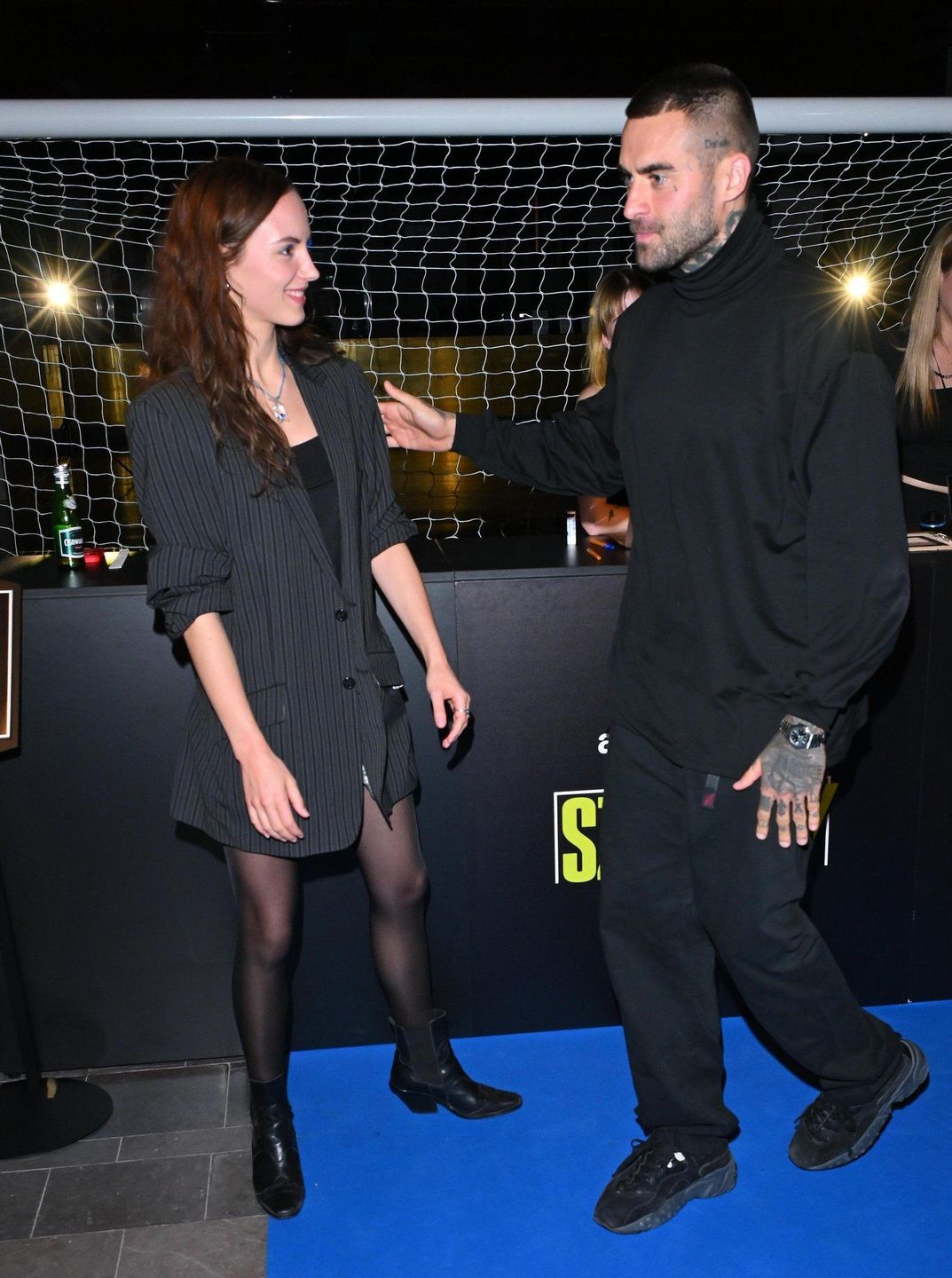 Martyna Byczkowska i Quebonafide na premierze filmu "Szczęsny"