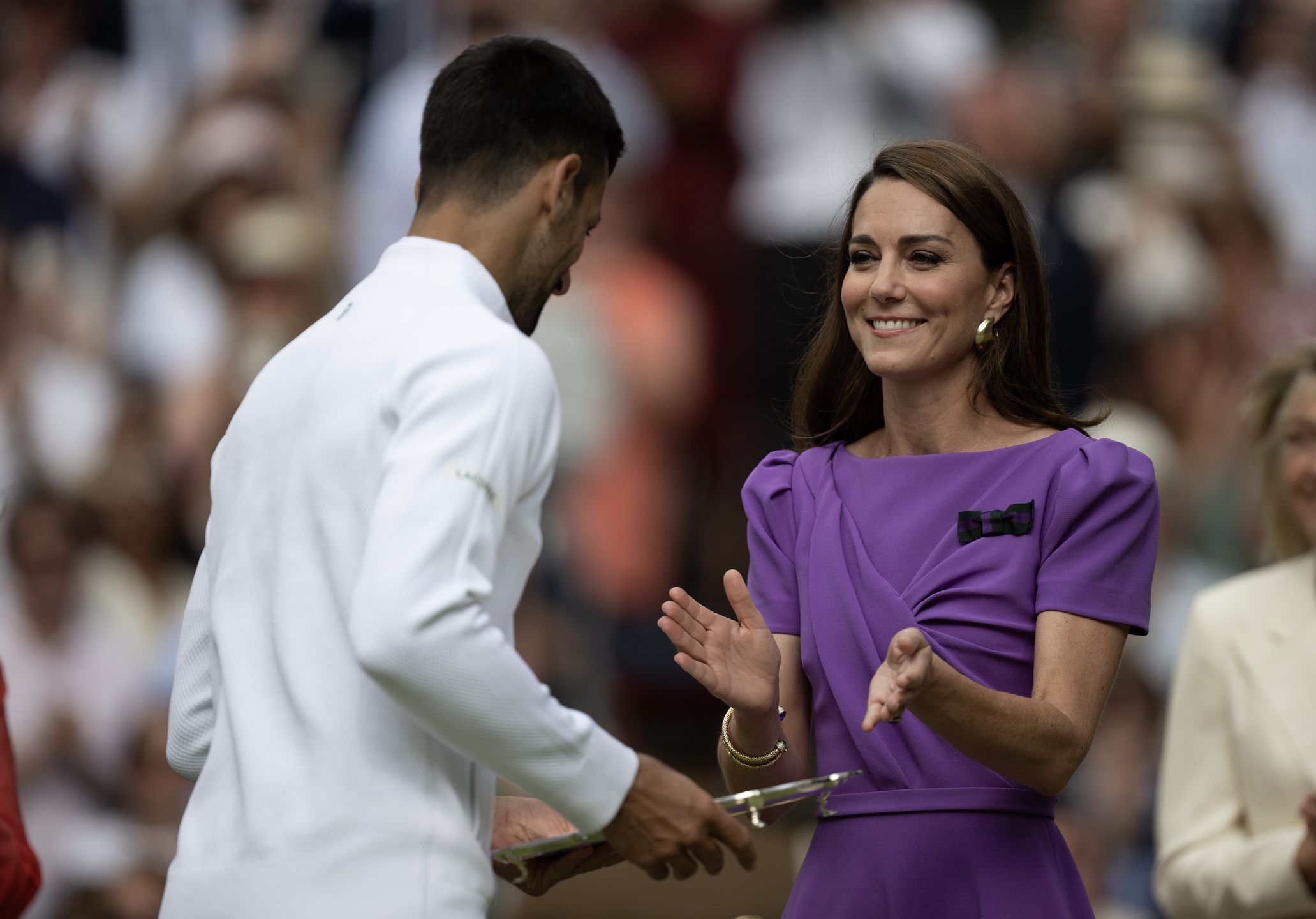 LONDON, ENGLAND - JULY 14: Catherine, Princess of Wales presents Novak Djokovic with the runners up plate during the trophy presentation for the Carlos Alcaraz of Spain vs. Novak Djokovic of Serbia Gentlemen's Singles Final during day fourteen of The Championships Wimbledon 2024 at All England Lawn Tennis and Croquet Club on July 14, 2024 in London, England. (Photo by Visionhaus/Getty Images)