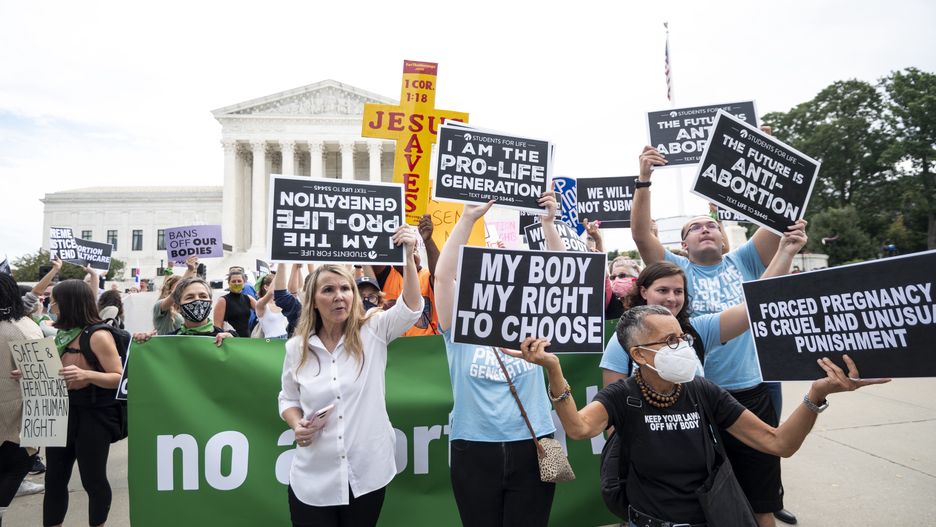UNITED STATES - OCTOBER 4: Reproductive rights and pro-life protesters demonstrate in front of the U.S. Supreme Court on Monday, Oct. 4, 2021. The new term of the court began on Monday. (Photo by Bill Clark/CQ-Roll Call, Inc via Getty Images)