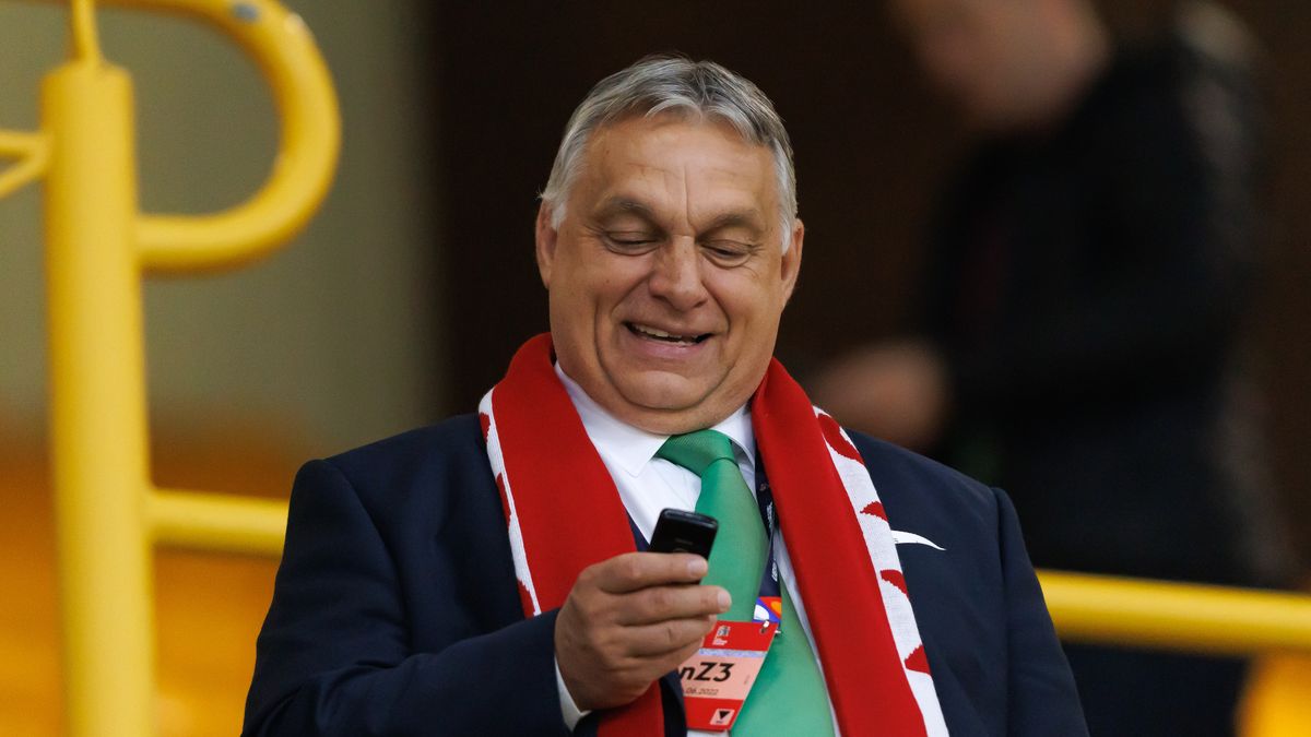 WOLVERHAMPTON, ENGLAND - JUNE 14:  Viktor Orban Prime Minister of Hungary reacts as he looks at his mobile phone during the UEFA Nations League League A Group 3 match between England and Hungary at Molineux on June 14, 2022 in Wolverhampton, United Kingdom. (Photo by Marc Atkins/Getty Images)