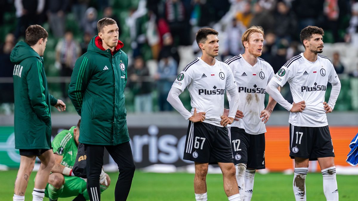 WARSAW, POLAND - 2024/02/22: Dominik Hladun, Bartosz Kapustka, Radovan Pankov, Gil Dias (from L to R) of Legia are seen after the UEFA Europa Conference League knockout round play-off match between Legia Warszawa and Molde FK at Marshal Jozef Pilsudski Legia Warsaw Municipal Stadium. Final score; Legia Warszawa 0:3 Molde FK. (Photo by Mikolaj Barbanell/SOPA Images/LightRocket via Getty Images)