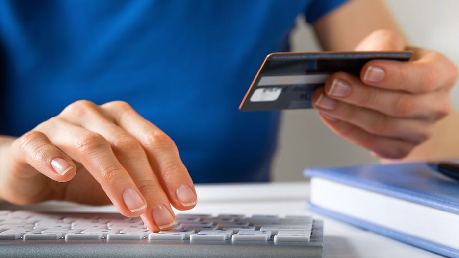 A Woman Is Holding A Credit Card, Typing on A Laptop Keyboard. There's a Notepad and a Pen next to it. The Concept of Buying Online, Ordering Products at Home, and paying via the Internet.
A Woman Is Holding A Credit Card, Typing on A Laptop Keyboard. There's a Notepad and a Pen next to it. The Concept of Buying Online, Ordering Products at Home, and paying via the Internet.
Aleksandr Zubkov