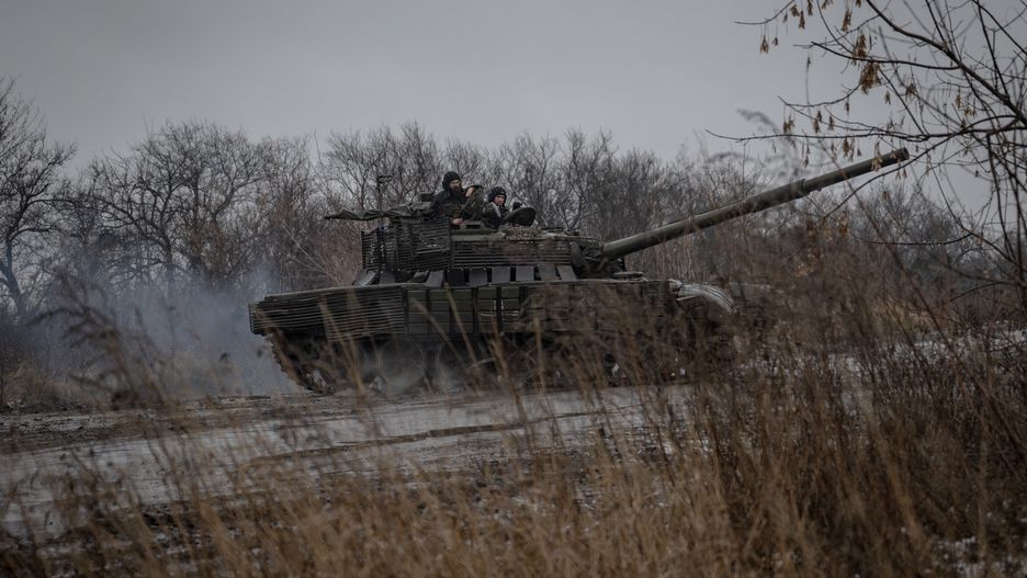 AVDIIVKA, UKRAINE - DECEMBER 01: A Ukrainian tank moves as Russia and Ukraine war continues in the direction of Avdiivka of Donetsk Oblast, Ukraine on December 01, 2023. As Ukrainian tank troops deployed in the Avdiivka direction, where heavy clashes have been continuing due to the intensification of Russian attacks lately, play an important role in keeping the defense line standing. In some parts of the region, which has been covered in mud due to the bad weather conditions, tracked combat vehicles such as tanks can move. (Photo by Ozge Elif Kizil/Anadolu via Getty Images)