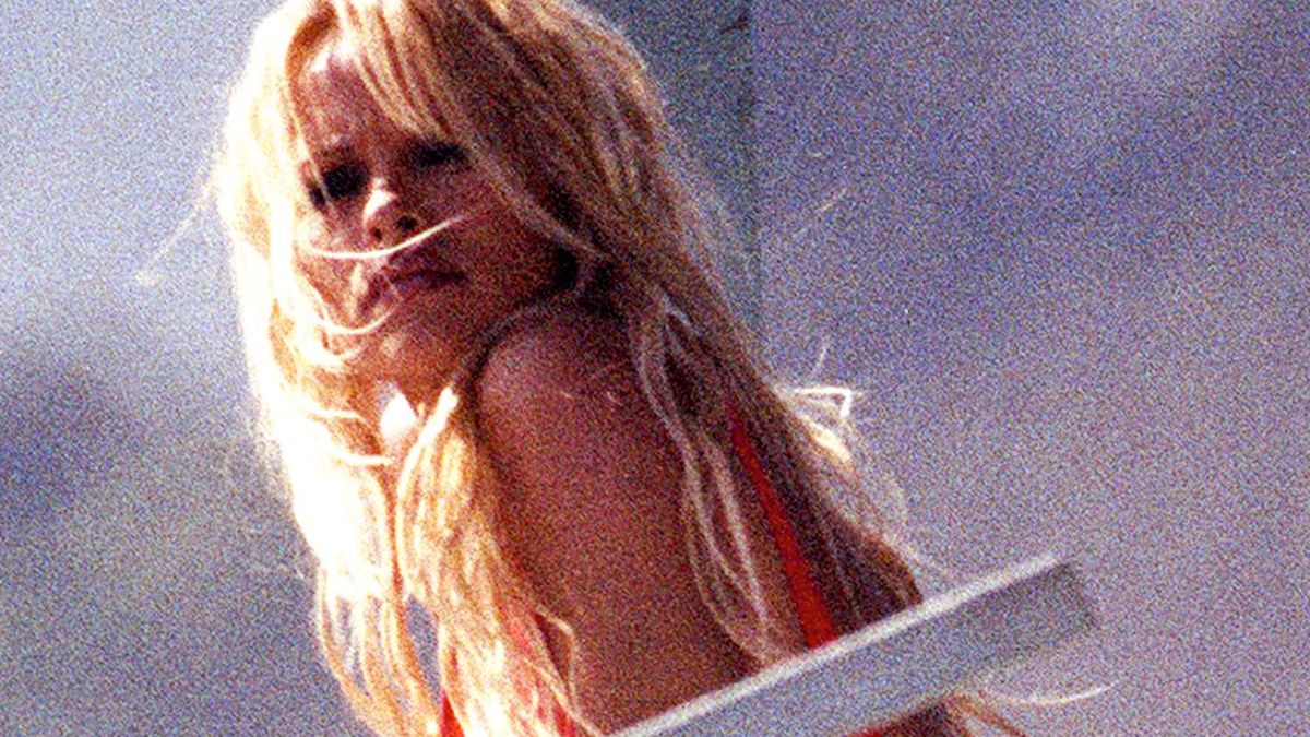 Pamela AndersonCanadian actress Pamela Anderson on 'Baywatch', circa 1990.  (Photo by Kypros/Getty Images)Kyprostelevision series, standing, swimsuit, day, Huty18961, outdoors, one woman only