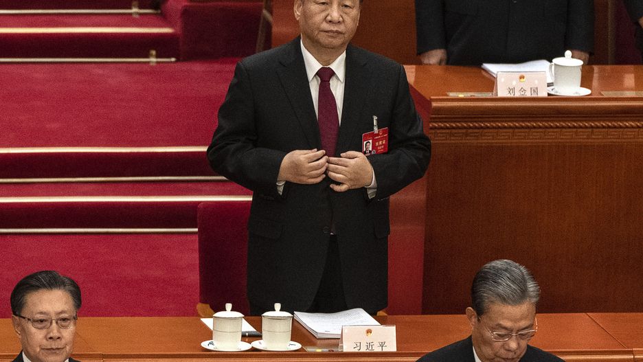 BEIJING, CHINA - MARCH 5: Chinese President Xi Jinping stands during the opening of the NPC, or National People's Congress, at the Great Hall of the People on March 5, 2024 in Beijing, China. China's annual political gathering known as the Two Sessions will convene leaders and lawmakers to set the government's agenda for domestic economic and social development for the year. (Photo by Kevin Frayer/Getty Images)