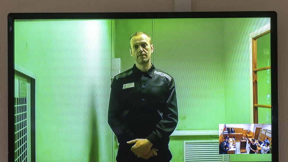 Temporary
Russian opposition leader Alexei Navalny is seen on a TV screen, as he appears in a video link from prison provided by the Russian Federal Penitentiary Service in a courtroom in Kovrov, 240 km (150 miles) north-east of Moscow, Russia, Friday, Sept. 2, 2022. Russian President Vladimir Putin's fiercest foe, was sentenced to nine years in prison on charges of fraud and contempt of court, allegations he rejected as a politically motivated attempt by Russian authorities to keep him behind bars for as long as possible. (AP Photo)
AP