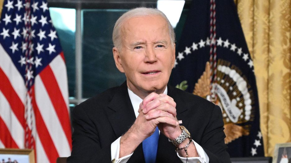 WASHINGTON, DC - JANUARY 15: US President Joe Biden gestures as he delivers his farewell address to the nation from the Oval Office of the White House on January 15, 2025 in Washington, DC. (Photo by Mandel Ngan - Pool/Getty Images)