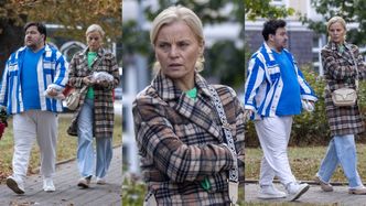 Małgorzata Foremniak z PARTNEREM dzierżącym bukiet róż odwiedzają warszawski szpital