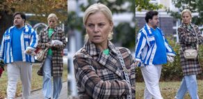 Małgorzata Foremniak z PARTNEREM dzierżącym bukiet róż odwiedzają warszawski szpital