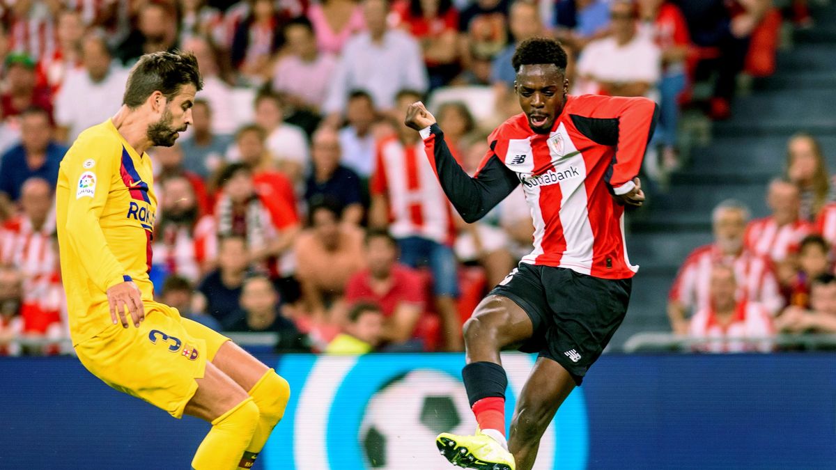 Gerard Pique (lewej) i Inaki Williams (z prawej)