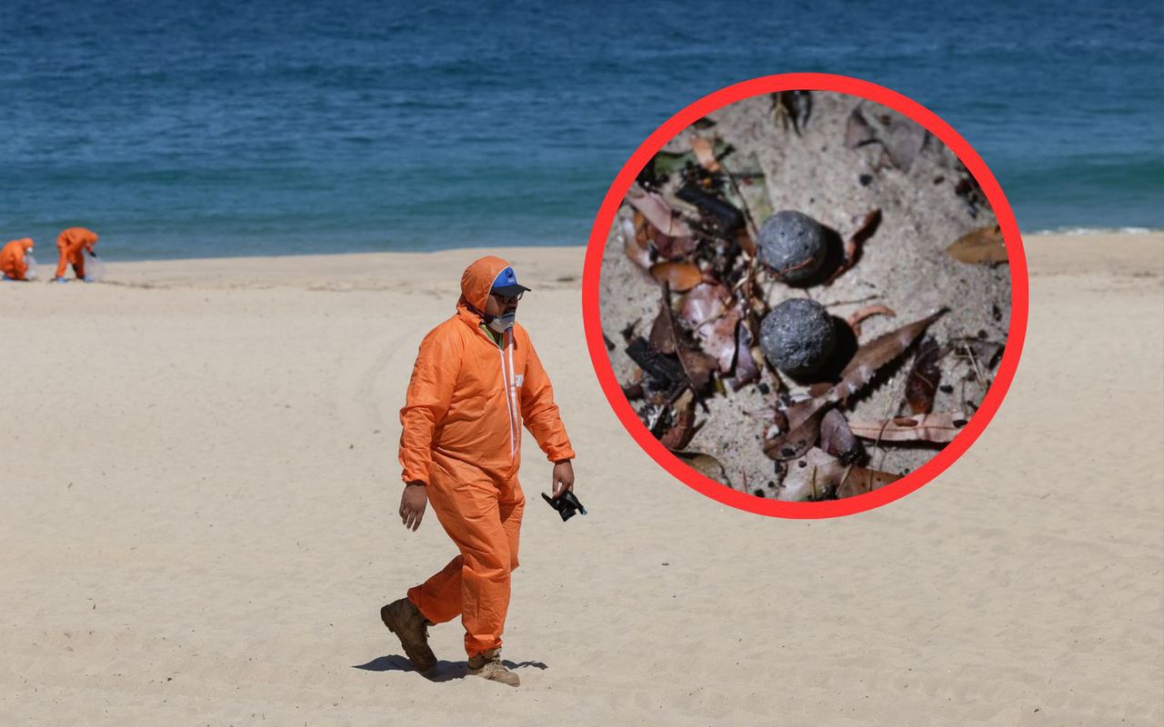 Mysterious black balls close Sydney's Coogee Beach