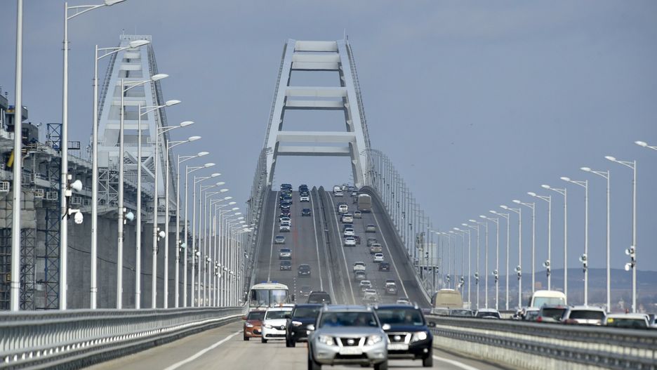 Temporary
Cars and other vehicles drive on the Crimean Bridge connecting Russian mainland and Crimean peninsula over the Kerch Strait after restoration works, not far from Kerch, Crimea on in Kerch, Crimea, Thursday, Feb. 23, 2023. All lanes of the Crimean bridge are fully open to car traffic 39 days ahead of schedule," Russian Deputy Prime Minister Marat Khusnullin said. The 17-kilometer (10.5-mile) bridge was opened in 2018, four years after Russia annexed Crimea from Ukraine. (Rosavtodor Press Service via AP)