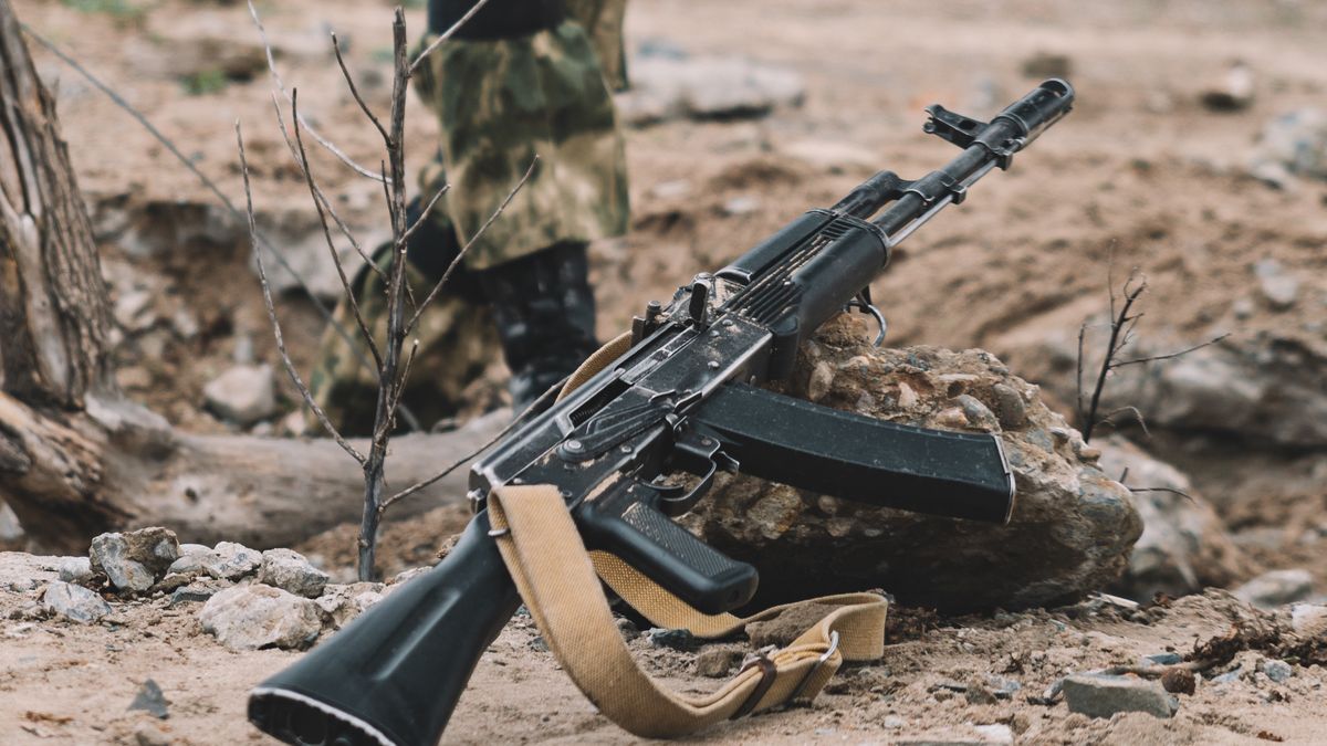 A Kalashnikov assault rifle is lying on ground. The concept of warA Kalashnikov assault rifle is lying on the ground. The concept of warmilitary, weapon, war, kalashnikov, army, field, battle, terrorist, gun, fight, russia, security, automatic, soviet, rifle, wild, ammo, defense, firearm, training, safety, infantry, ak-47, armament, death, ak-74, artsakh, transnistria, ukraine, armenia, Israel, Palestine, Gaza strip, azerbaijan, concept, defeat, retreat, helmet, battlefield, actions, defending, equipment, conflict, machine gun, russian, kalashnikov assault rifle, combat action, war shooting, military operations, military, weapon, war, kalashnikov, army, field, battle, terrorist, gun, fight, russia, security, automatic, soviet, rifle, wild, ammo, defense, firearm, training, safety, infantry, ak-47, armament, death, ak-74, artsakh, transnistria, ukraine, armenia, israel, palestine, gaza strip, azerbaijan, concept, defeat, retreat, helmet, battlefield, actions, defending, equipment, conflict, machine gun, russian, kalashnikov assault rifle, combat action, war shooting, military operations