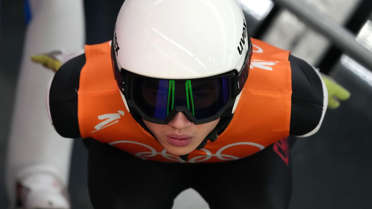 ZHANGJIAKOU, CHINA - FEBRUARY 14: Qiwu Song of Team China looks on during Men's Ski jumping Trial Round For Competition on Day 10 of Beijing 2022 Winter Olympics at National Ski Jumping Centre on February 14, 2022 in Zhangjiakou, China. (Photo by Matthias Schrader - Pool/Getty Images)