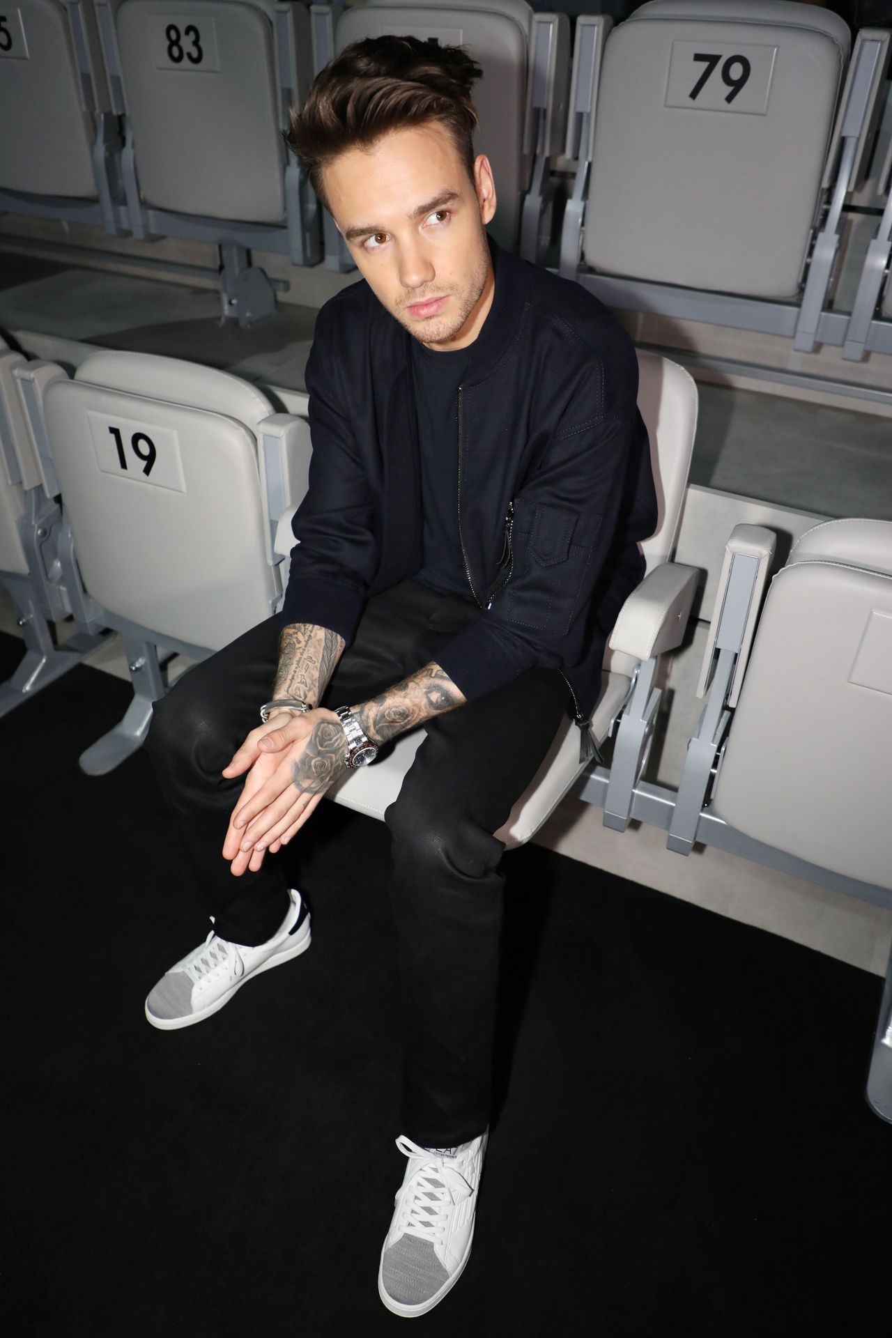 Liam Payne in the front row (Photo by Lodovico Colli Di Felizzano/WWD/Penske Media via Getty Images)