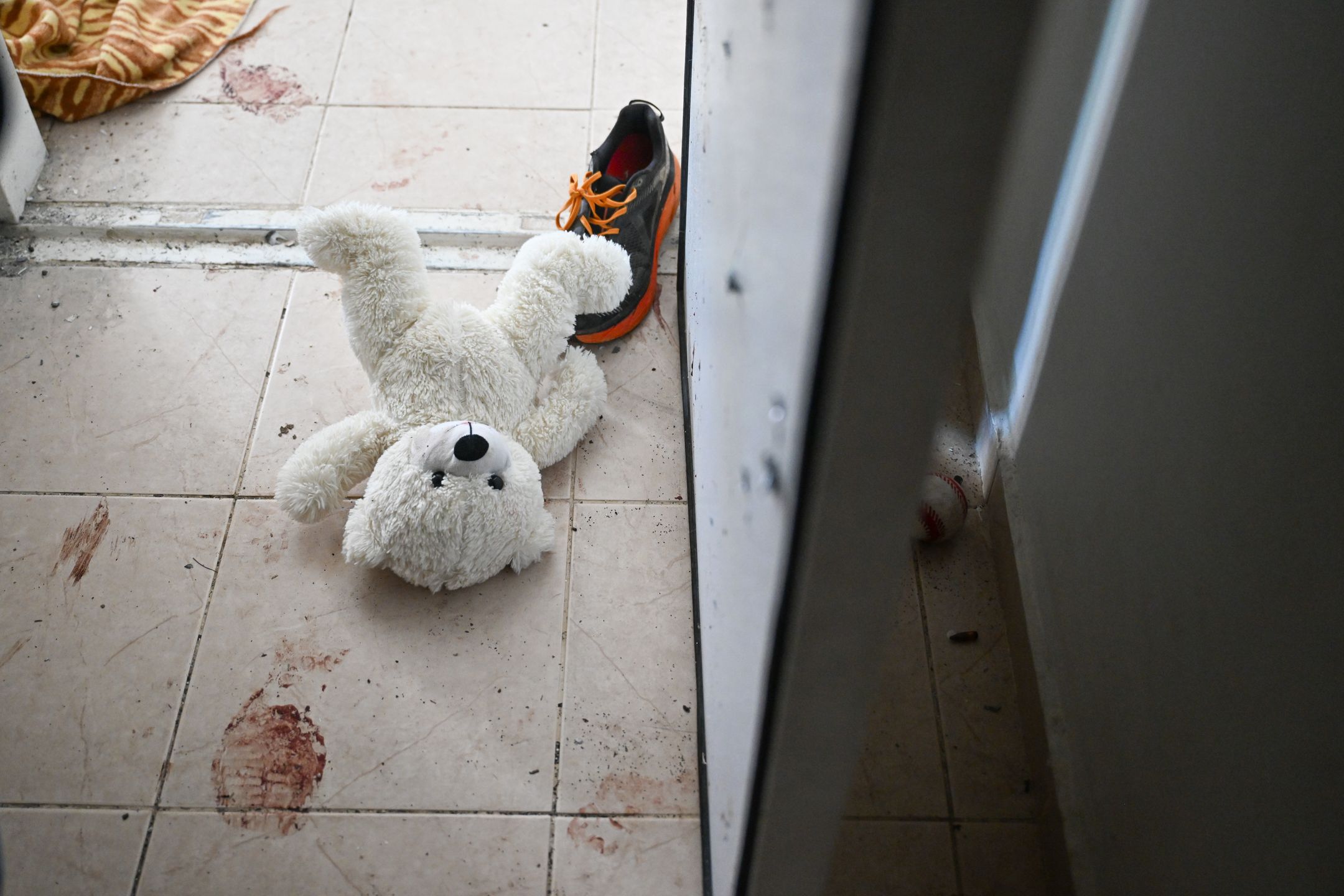 More Than Half Of Israel's Oct 7 Victims Laid To Rest, While Many Remain UnidentifiedHOLIT, ISRAEL - NOVEMBER 01: A teddy bear is seen left on the ground near the bomb shelter of a kibbutz home attacked by Hamas on Oct 7th, near the border with Gaza, on November 01, 2023 in Holit, Israel. According to an IDF officer, two grandparents who resided here held the bomb shelter door closed during the attack to protect their grandchildren. All were injured but survived. (Photo by Alexi J. Rosenfeld/Getty Images)Alexi J. Rosenfeldbestof, topix