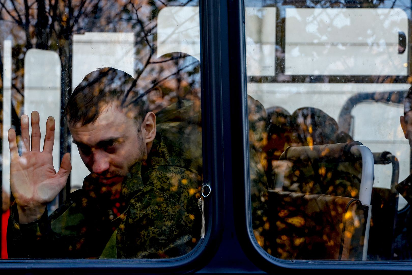MOSCOW, RUSSIA - OCTOBER 10: Relatives say goodbye to Russian citizens drafted during the partial mobilisation as they depart to their military units after completing their transactions due to a military call-up for the Russia-Ukraine war in Moscow, Russia  on October 10, 2022. Citizens were sent to their troop units after completing their procedures in recruiting offices in the capital. (Photo by Sefa Karacan/Anadolu Agency via Getty Images)