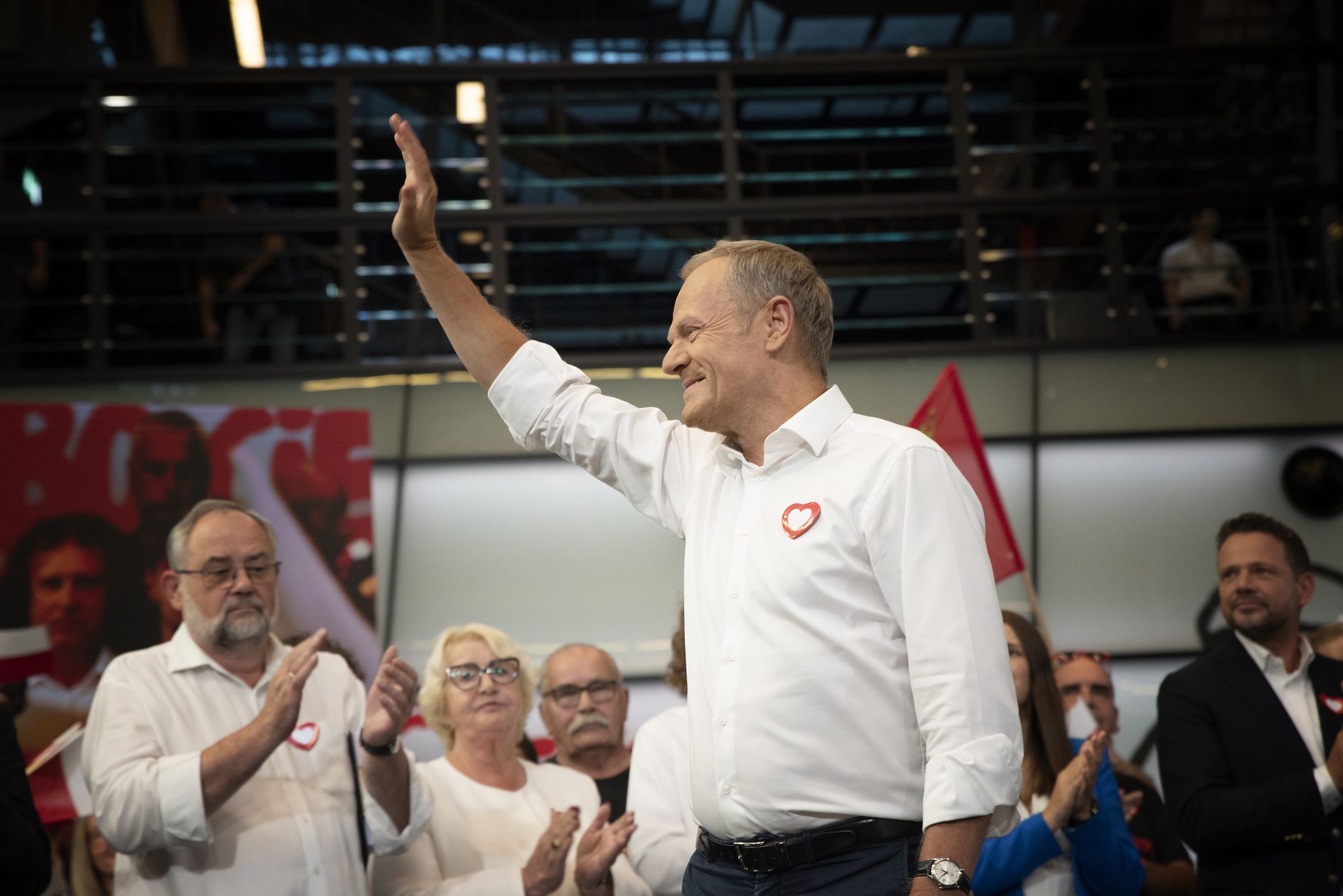 GDANSK, POLAND - 2023/09/01: Donald Tusk greets his supporters during the Civic Platform (PO) party election rally. The former Prime Minister of Poland and current leader of the Civic Platform (PO) party, Donald Tusk, and his party members hold an election rally at the European Solidarity Centre in Gdansk. Civic Platform is a center-right political party in Poland. The rally was held on the day of the 43rd anniversary of the August agreement, which the former Prime Minister recalled in his speech . Civic Platform party members namely, Aleksandra Dulkiewicz, Mayor of Gdansk, Piotr Adamowicz, Henryka Krzywonos-Strycharska, and Rafa Trzaskowski, Mayor of Warsaw, delivered speeches during the rally. (Photo by Agnieszka Pazdykiewicz/SOPA Images/LightRocket via Getty Images)