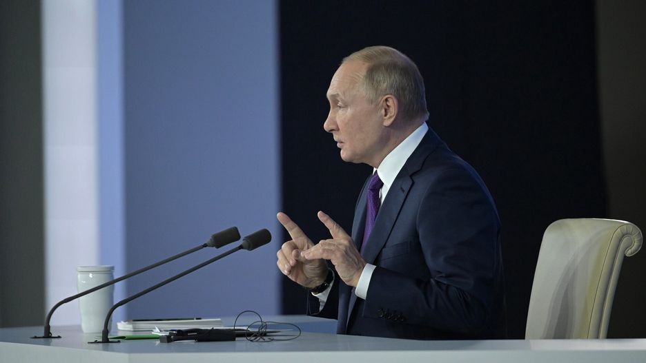 MOSCOW, RUSSIA - DECEMBER 23: (---EDITORIAL USE ONLY â MANDATORY CREDIT - "KREMLIN PRESS OFFICE / HANDOUT" - NO MARKETING NO ADVERTISING CAMPAIGNS - DISTRIBUTED AS A SERVICE TO CLIENTS----) Russian President Vladimir Putin speaks during his annual press conference at the Moscow Manege on December 23, 2021 in Moscow, Russia. More than 500 journalists are invited to Putin's end-of-year marathon press conference. (Photo by Kremlin Press Office / Handout/Anadolu Agency via Getty Images)