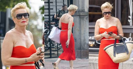 ELEGANCKA Paulina Smaszcz przemierza Warszawę w czerwonym wdzianku, odsłaniając liczne tatuaże. Petarda? (ZDJĘCIA)