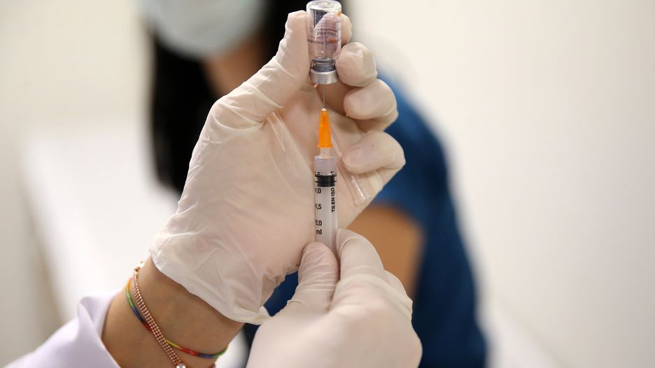ADANA, TURKEY - JANUARY 14: A health worker prepares for the CoronaVac vaccine against coronavirus (Covid-19) pandemic after the vaccine was issued "Emergency Use Authorization" at Adana City Training and Research Hospital in Adana, Turkey on January 14, 2021. (Photo by Eren Bozkurt/Anadolu Agency via Getty Images)