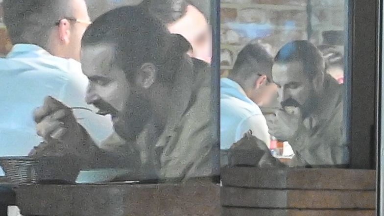 Samotny Piotr Stramowski załatwia sprawunki późnym wieczorem