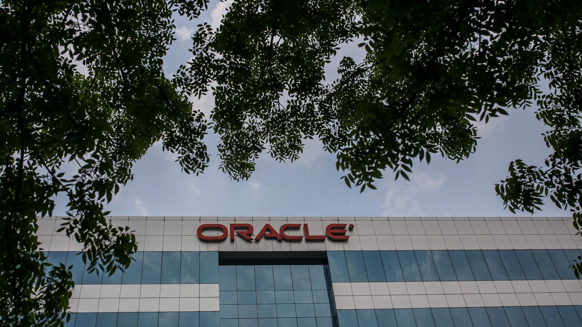 The Oracle Corp. logo atop a building housing the company's offices in the Hyderabad Information Technology and Engineering Consultancy City (HITEC City) area of Hyderabad, India, on Wednesday, March 23, 2022. Indias urban consumption is driving recovery from late pandemic wave but has further intensified the divergence between cities and the hinterland, according to a report by Citigroup Inc released last week. Photographer: Dhiraj Singh/Bloomberg via Getty Images