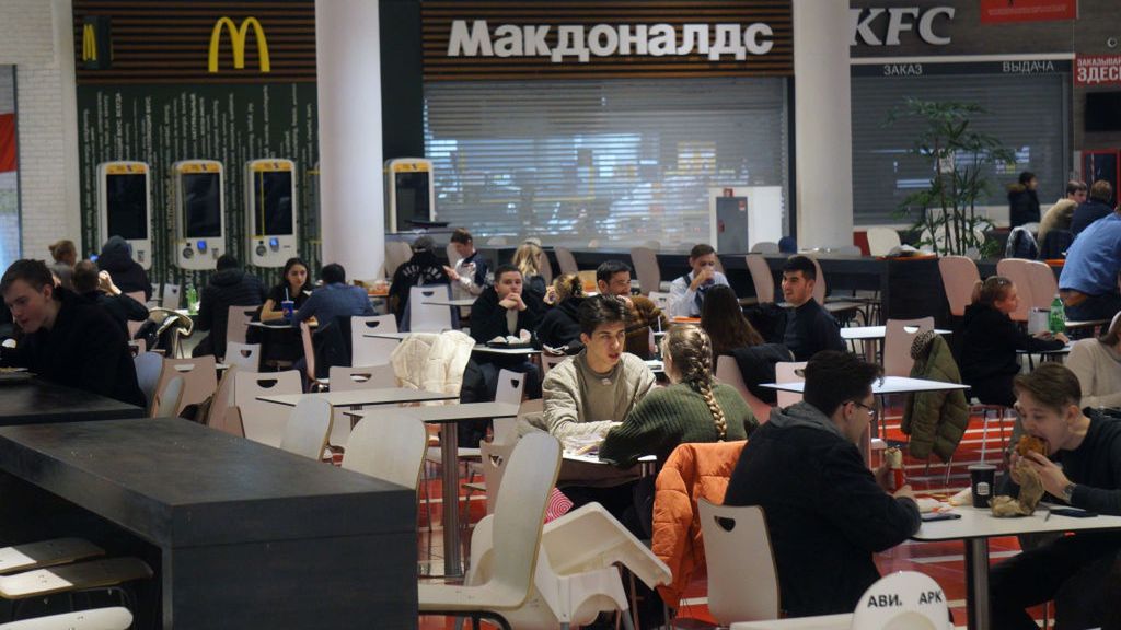 Economic Situation In Russia
MOSCOW, RUSSIA - MARCH,15 (RUSSIA OUT): People are having dinner in a food court in front of closed McDonald's and KFC restaurants at a shopping mall, March 15, 2022, in Moscow, Russia. McDonald's closed all its restaurants, KFC suspended any investment in Russia as a result of the U.S. and EU economic sanctions.  (Photo by Konstantin Zavrazhin/Getty Images)
Konstantin Zavrazhin