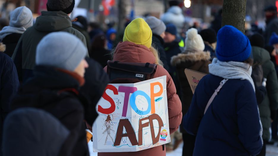 Demonstrators protest against the Alternative für  Deutschland (AfD) party, outside of the Reichstag building in Berlin, Germany, on Sunday, Jan. 21, 2023. The mass protests follow the recent revelation of a meeting at which senior AfD politicians and members of the main opposition Christian Democrats discussed a "re-migration" scheme that echoed Nazi policies of the 1930s. Photographer: Krisztian Bocsi/Bloomberg via Getty Images
