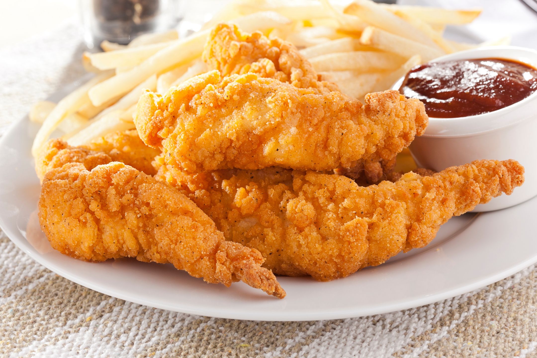 Organic Crispy Chicken Strips on a backgroundBrent Hofackerchicken, food, meal, fried, strips, meat, breaded, dinner, supper, sauce, delicious, snack, strip, battered, crispy, baked, crunchy, appetizers, unhealthy, fattening, fast, coating, drip, crumbs, tender, honey, grease, golden