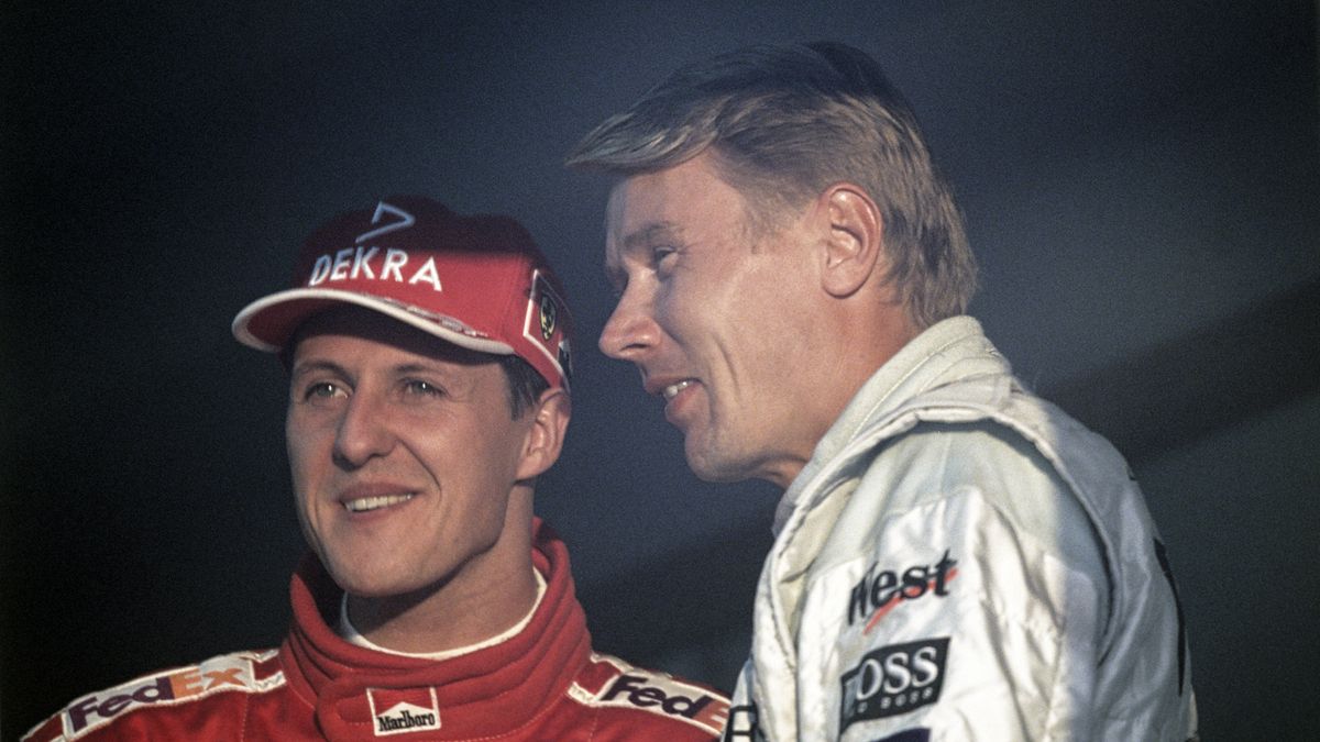 Mika Häkkinen, Michael Schumacher , Grand Prix of Japan, Suzuka Circuit, 31 October 1999. Michael Schumacher and Mika Hakkinen, two fierce rivals. (Photo by Paul-Henri Cahier/Getty Images)