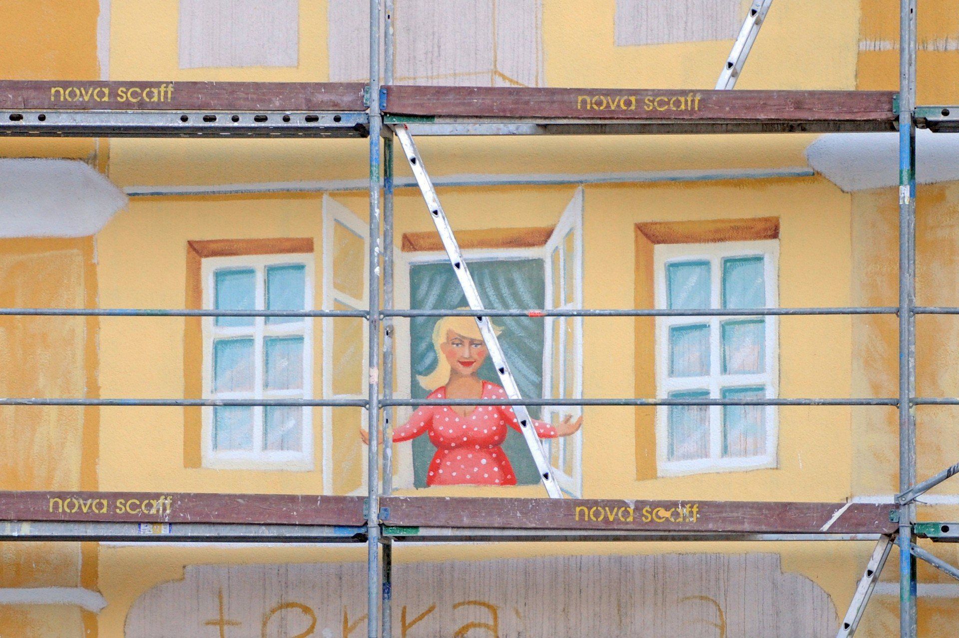 Mural &#34;Opowieść śródecka&#34; w Poznaniu