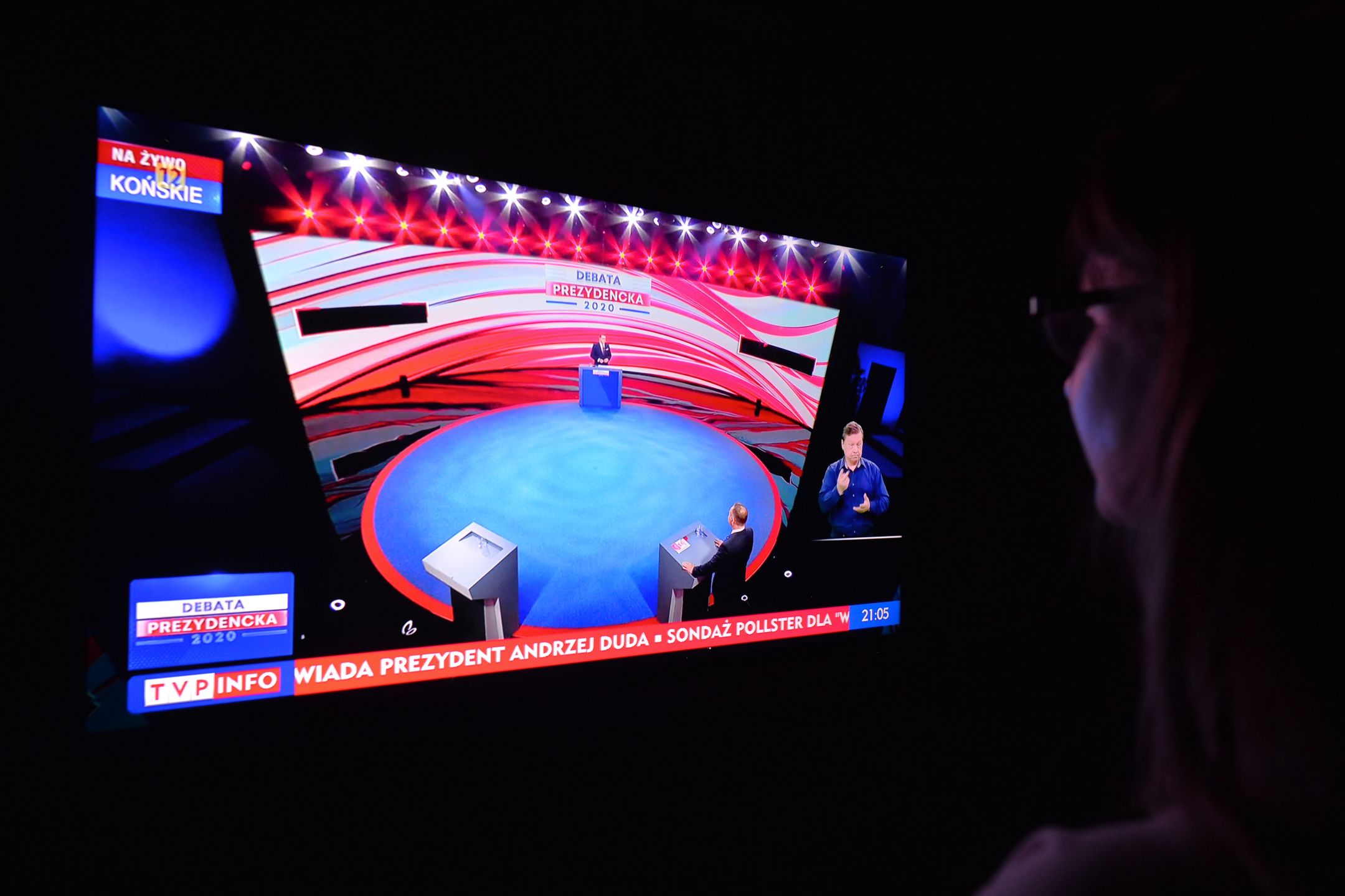 A woman watches the official televised presidential debate organised in the town of Konskie (Swietokrzyskie Voivodeship) and broadcasted on TVP1, Poland's public broadcaster channel.Only one candidate Andrzej Duda attended the debate, while his rival Rafal Trzaskowski failed to turn up. Instead, he organised his own debate in Leszno (Greater Poland Voivodeship) on TVN, Commercial free-to-air channel.On  July 06, 2020, in Krakow, Lesser Poland Voivodeship, Poland. (Photo by Artur Widak/NurPhoto via Getty Images)