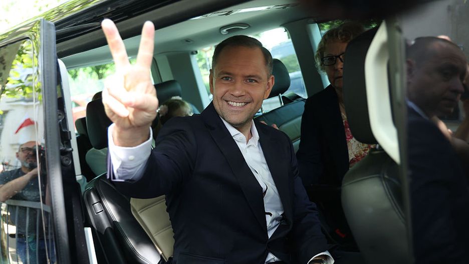 Poland Holds Presidential Runoff Election
WARSAW, POLAND - JUNE 01: Karol Nawrocki, presidential candidate of the Law and Justice Party (PiS), gestures after he cast his ballot at a polling station during the Polish presidential runoff election on June 01, 2025 in Warsaw, Poland. Today's election is a closely contested race between Nawrocki and Rafal Trzaskowski, the liberal mayor of Warsaw who is supported by Prime Minister Donald Tusk. The election is seen as a test of whether the government, with its centrist parliamentary coalition, can overcome the right-wing populism embodied by PiS. (Photo by Sean Gallup/Getty Images)
Sean Gallup
bestof, topix