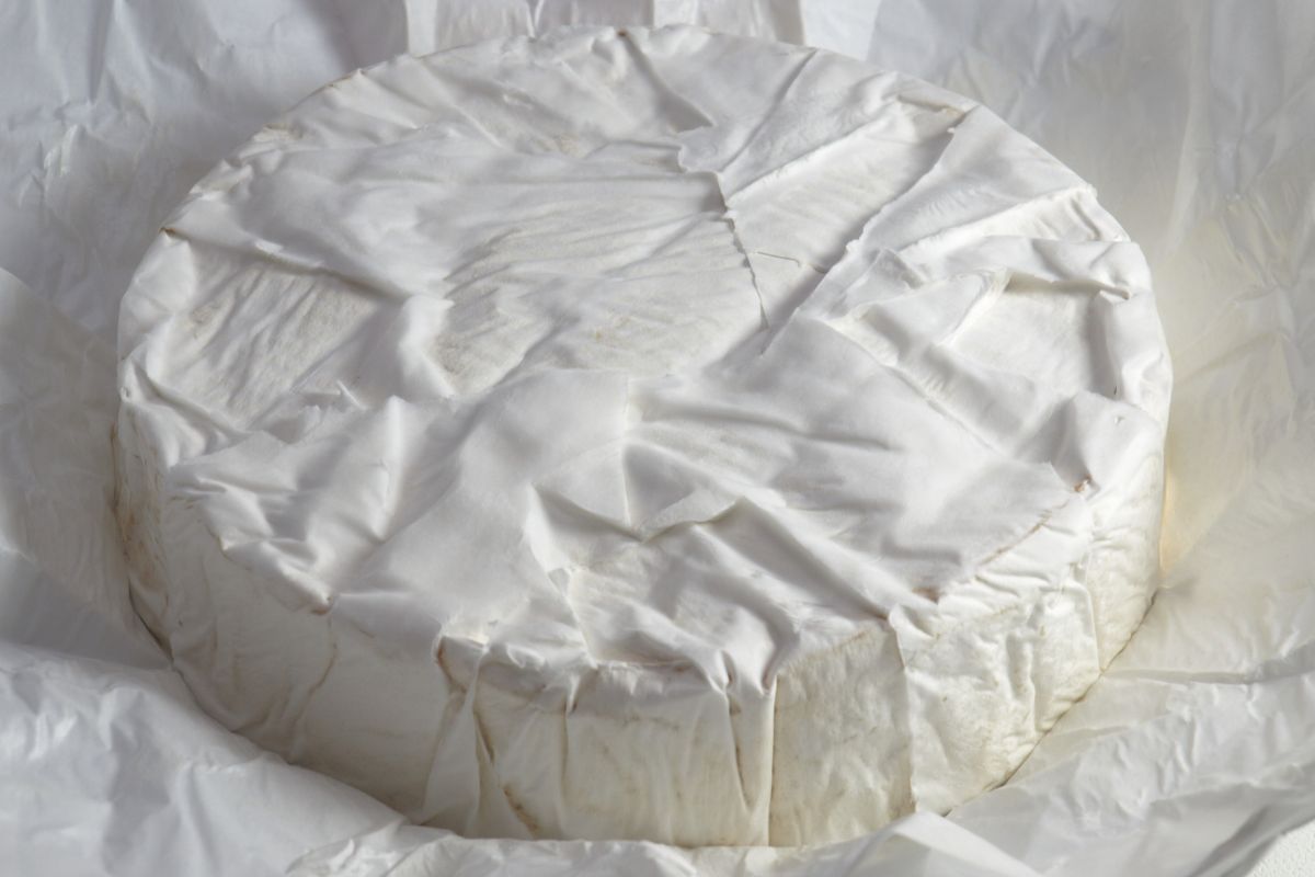 The rind of camembert is edible, but not everyone likes it.