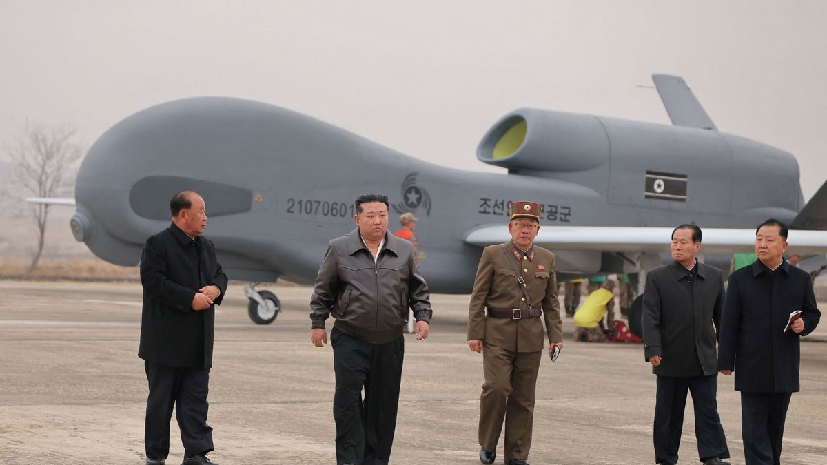 Temporary
This undated picture released by North Korea's official Korean Central News Agency (KCNA) on March 27, 2025 shows North Korean leader Kim Jong Un (2nd L) inspecting newly developed unmanned reconnaissance aircraft at an undisclosed location in North Korea. (Photo by KCNA VIA KNS / AFP) / South Korea OUT / ---EDITORS NOTE--- RESTRICTED TO EDITORIAL USE - MANDATORY CREDIT "AFP PHOTO/KCNA VIA KNS" - NO MARKETING NO ADVERTISING CAMPAIGNS - DISTRIBUTED AS A SERVICE TO CLIENTS
THIS PICTURE WAS MADE AVAILABLE BY A THIRD PARTY. AFP CAN NOT INDEPENDENTLY VERIFY THE AUTHENTICITY, LOCATION, DATE AND CONTENT OF THIS IMAGE. /
STR