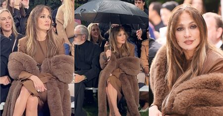 Poirytowana Jennifer Lopez MOKNIE na pokazie w Paryżu. Obsługa ZABRAŁA JEJ parasol, bo zasłaniała innym show. Niemiło? (ZDJĘCIA)