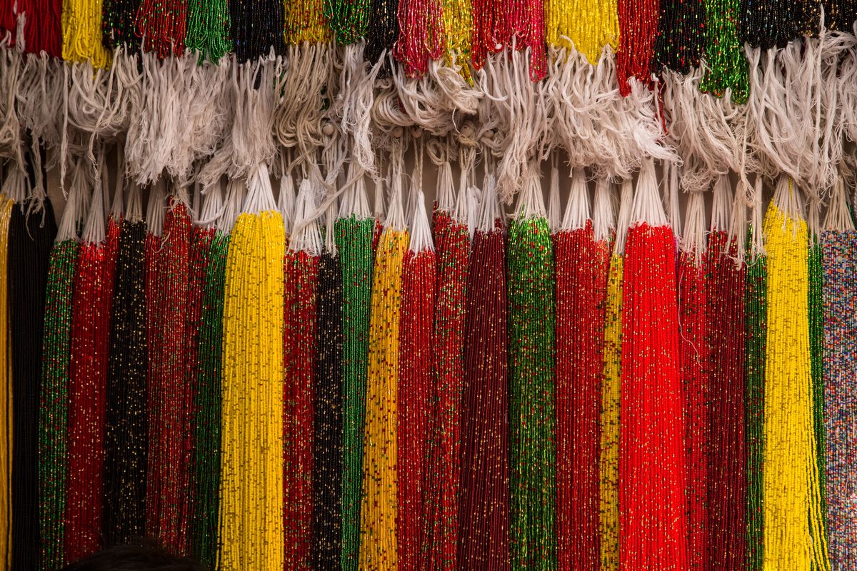 Colorful beaded neclaces or pokeys are made in the bead bazaar by Muslim men but worn primarily by Hindu women in Nepal. (Photo by: Jon G. Fuller/VW Pics/Universal Images Group via Getty Images)