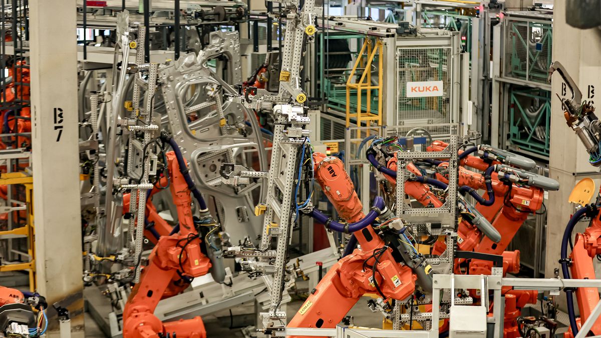 MUNICH, GERMANY - DECEMBER 05: A look at robots from the manufacturer Kuka in a production hall during the visit of German Chancellor Olaf Scholz to the BMW Group car factory on December 05, 2023 in Munich, Germany. His visit is taking place as Scholz's government wrestles with a federal budget crisis stemming from a recent Federal Constitutional Court ruling. (Photo by Leonhard Simon/Getty Images)