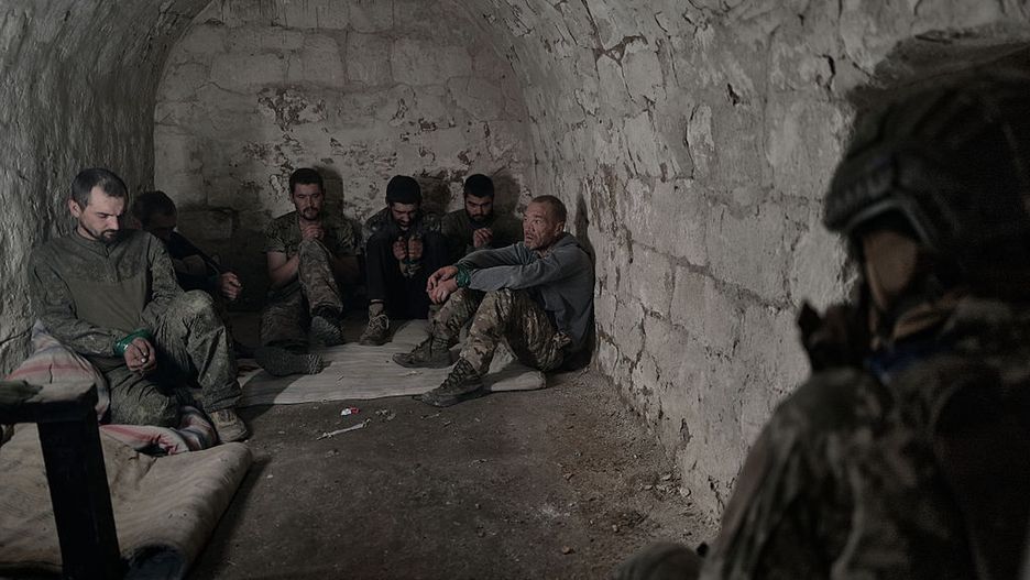 Russian Servicemen Captured In The Donetsk Region In Ukraine
DONETSK REGION, UKRAINE - AUGUST 17: Captured Russian servicemen of the Russian army sit under guard after being taken prisoner by soldiers of Ukraine's 82nd Air Assault Brigade in the area between Dobropillia and Pokrovsk, where Russian forces had recently made a 10-kilometer breakthrough, on August 17, 2025 in Donetsk Region, Ukraine. The prisoners were provided with medical aid, food, water, and cigarettes, as Ukrainian troops stabilized the situation in the sector and continue clearing operations and taking Russian soldiers captive.  (Photo by Vlada Liberova/Libkos/Getty Images)
Libkos