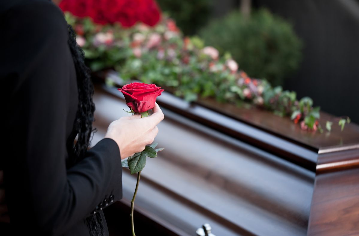 Sons' touching tribute: Painting their father's coffin