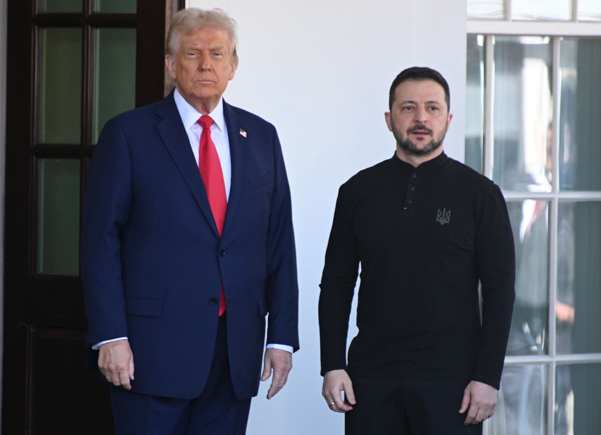 WASHINGTON, DC - FEBRUARY 28: U.S. President Donald Trump (L) greets Ukrainian president Volodymyr Zelensky as he arrives at the White House on February 28, 2025 in Washington, DC. (Photo by Chen Mengtong/China News Service/VCG via Getty Images)