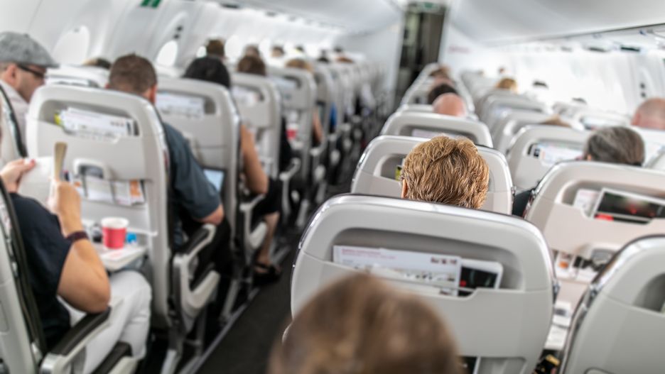 Interior of commercial airplane with passengers in their seats
Interior of commercial airplane with passengers in their seats during flight.
ViktorCap
aeroplane, air, aircraft, airline, attandant, cabin, carrier, chairs, commercial, entertaiment, flight, indoor, inside, interior, jet, job, light, man, plane, public, rear, row, screen, seating, serve, stewardess, transporation, transport, trip, voyage, work