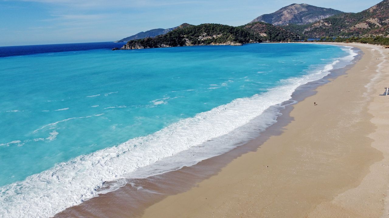 MUGLA, TURKEY - JANUARY 31: A drone photo shows an aerial view of Butterfly Valley and its surroundings as the water turns into turquoise color in Mediterranean Sea, in Olurdeniz of Fethiye, in Mugla, Turkey on January 31, 2021. (Photo by Ali Rza Akkir/Anadolu Agency via Getty Images)