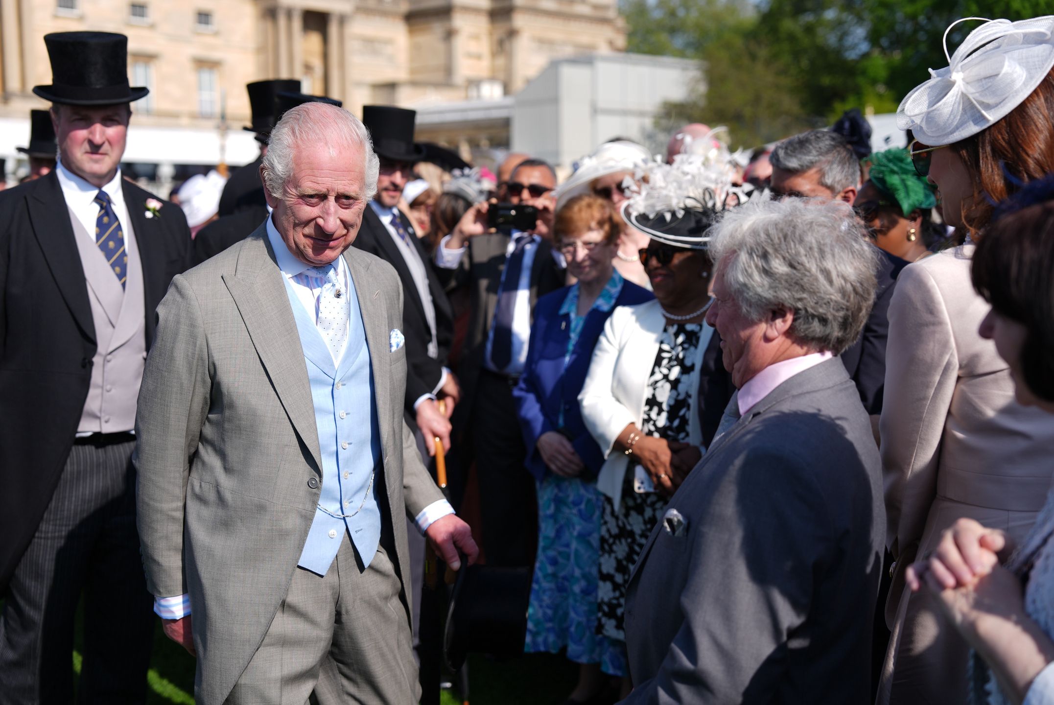 The Sovereign's Garden Party 2024 - May 8LONDON, ENGLAND - MAY 8: King Charles III speaks to guests attending a Royal Garden Party at Buckingham Palace on May 8, 2024 in London, England.  (Photo by Jordan Pettitt - Pool/Getty Images)Pool
