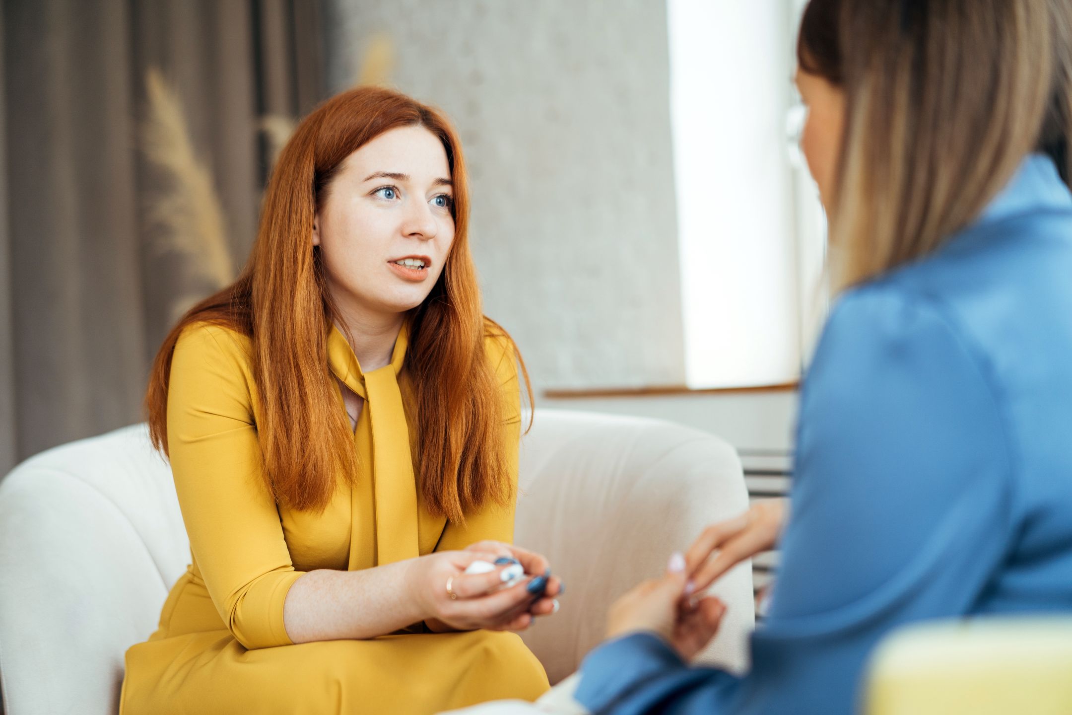 Two women in armchairs are sitting and talking
Two women in armchairs are sitting and talking. Woman psychologist practicing with  patient women. Coach session between girlfriends. Therapist's gestures. Female talking in the office
Fiordaliso
