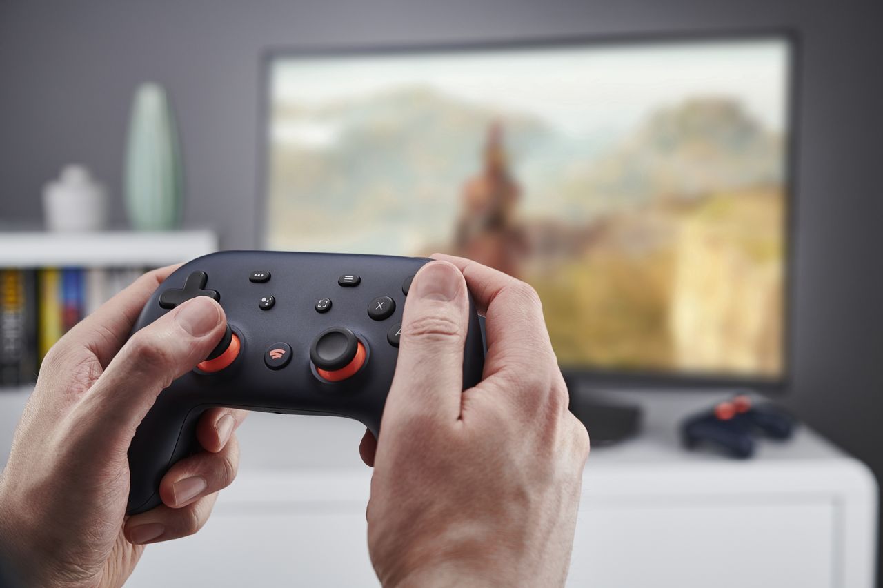 Detail of hands holding a Google Stadia video game controller, taken on November 27, 2019. (Photo by Olly Curtis/Future Publishing via Getty Images)