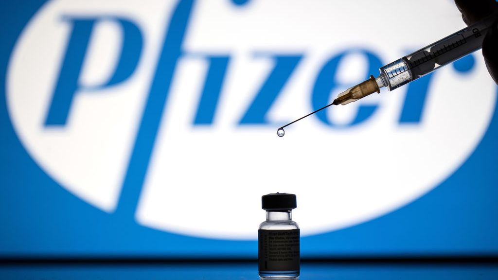 In this photo illustration a syringe and a vial with covid-
POLAND - 2021/01/15: In this photo illustration a syringe and a vial with covid-19 Pfizer vaccine and the Pfizer logo in the background. (Photo Illustration by Vito Corleone/SOPA Images/LightRocket via Getty Images)
SOPA Images
corona virus, pandemic, sars-cov-2, vaccine, corona, covid, covid19, immunity, infection, vaccinate, viral, brand
