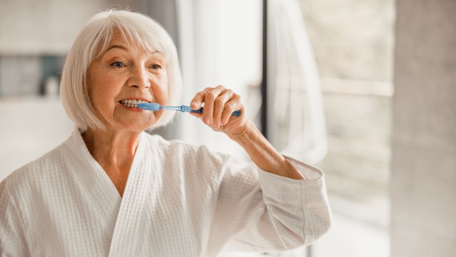Elderly woman in bathrobe brushing teeth in the morning
Lovely old lady cleaning teeth with toothbrush stock photo
woman, brush, teeth, old, toothbrush, Caucasian, hygiene, bathroom, female, indoors, adult, elderly, retiree, 60-65 years, lady, healthcare, senior, aged, retired, pensioner, morning, health, toothpaste, routine, care, dental, clean, oral, fresh, grooming, freshness, bathrobe, mature, blurred, background, stomatology